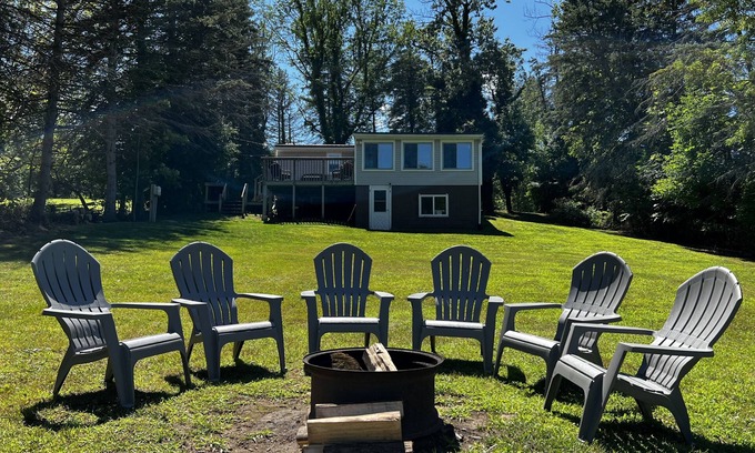 Wolcott Cottage | Serene Port Bay Cottage: waterfront, 3 kayaks, pedal boat, fire pit, grill, ac