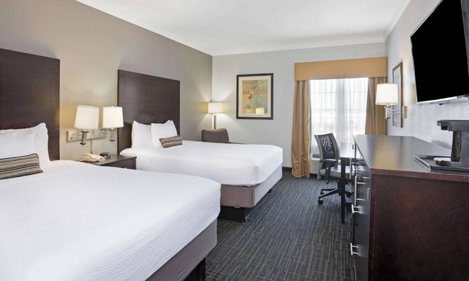 Westchase Hotel | Short Drive from Chinatown | Outdoor Pool Access, Pets Are Welcome!