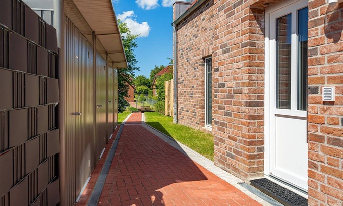 Eilsum Apartment | Sielkieker - Neue 72qm Ferienwohnung für 4 Personen mit Terrasse Direkt am Wasser