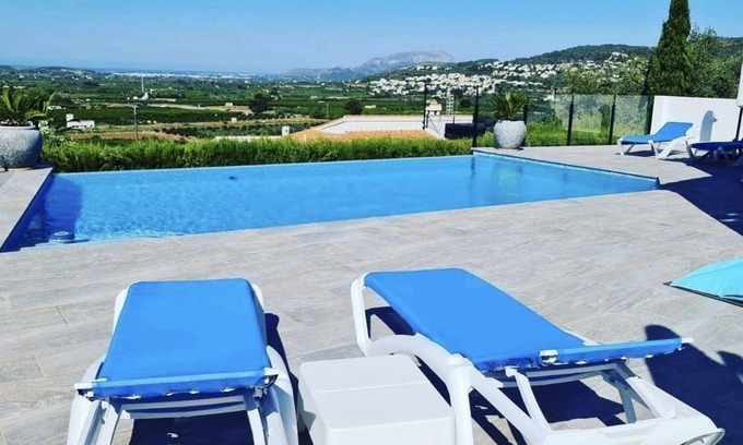 Orba House | Simply relax with a fantastic view of the valley, mountains and sea.
