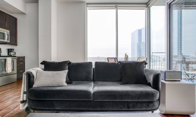 Waller Creek District Apartment | Sleek Downtown 1BR w/Gym, Deck & W/D, walk to 6th St bars, by Blueground