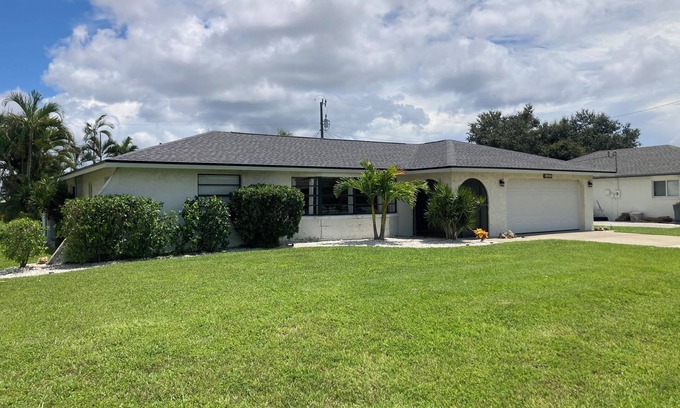 Caloosahatchee House | Spacious 3-bedroom home with backyard oasis, private heated pool, close to beach