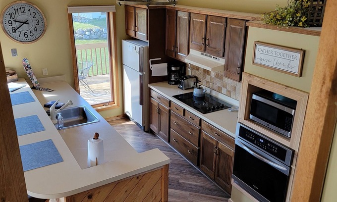 Mancelona Condo | Spacious 5 beds,2 full baths Golf, ski, Sleeps 6, KING bed, Wi-Fi close to Lakes
