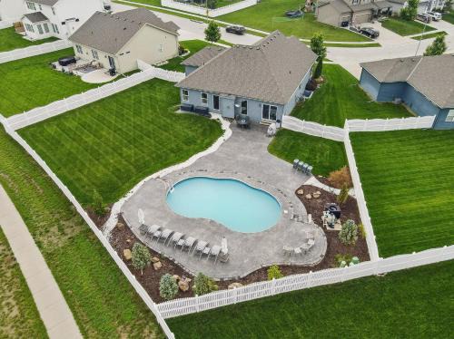 Papillion House | Spacious Country Farmhouse Retreat, Sleeps 16, Pool, Movie Room