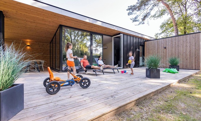 Maasbree House | Spacious eco-cottage for six, with modern kitchen and large terrace, set in peaceful woodlands at Breebronne in North Limburg.