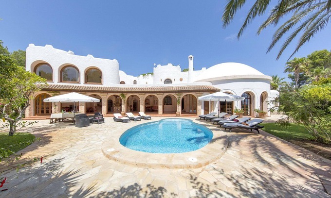 Santa Eulalia del Rio Villa | Spacious villa with a beautiful garden, private pool on the beach of Cala Llenya
