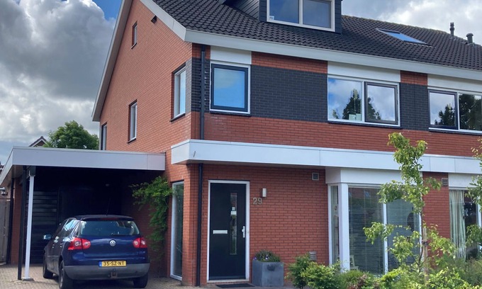 Hoogkerk House | Spacious family house for up to 8 people with garden and playground in front.