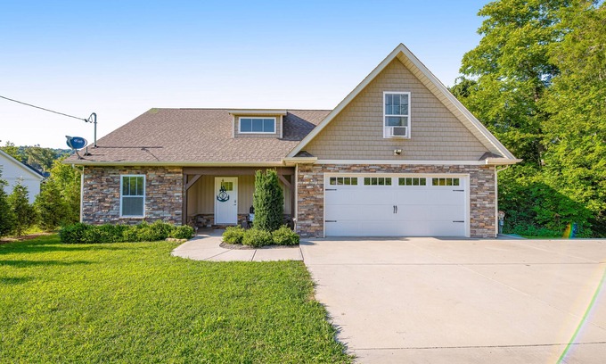Maynardville House | Spacious, lakefront home with private dock, hot tub, chic decor, & amazing views