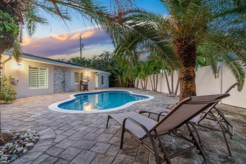 Coral Ridge Apartment | Spacious Living w/Heated Pool + Outdoor Patio