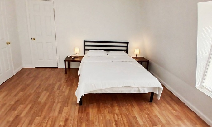 New London House | Spacious master bedroom with a queen and full bed, 2 blocks from Route 95