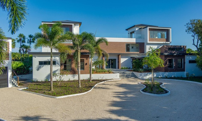 Cocoplum Villa | Spacious retreat with private pool, rooftop deck, kayaks, and pet-friendly perks