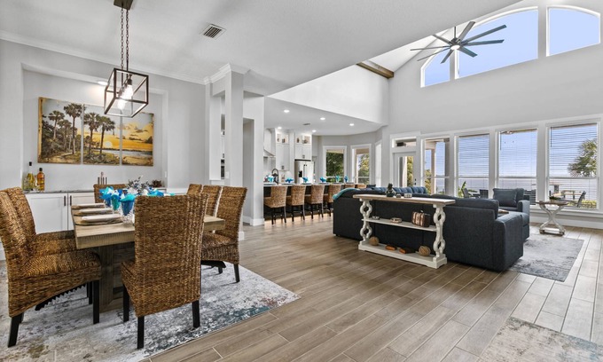 Green Cove Springs House | Spacious riverfront home perfect for larger families, featuring stunning river views, private dock