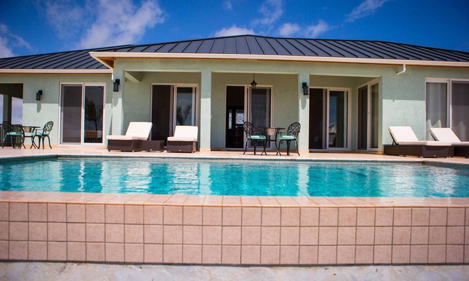Bottle Creek Villa | Spacious Secluded Waterfront Home with compact car