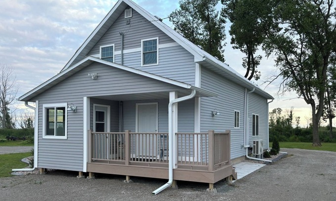 Oconto House | Spacious waterfront home recently remodeled with WiFi, AC, and cable TV.