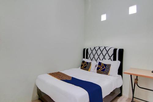 Dumai Hotel | SPOT ON 92797 Awi Stay Syariah Near SIMPANG KAWASAN INDUSTRI WILMAR PELINTUNG