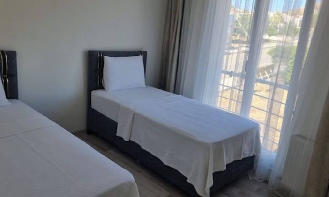 Gokceada Apartment | Spotlessly Clean. Shock Market Top 2+1 Apartment in the Center