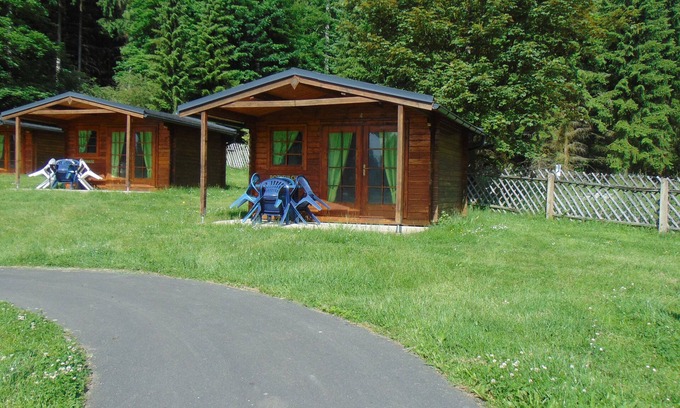Gelenau Cabin | Squirrel" log cabin at the Gelenau outdoor pool