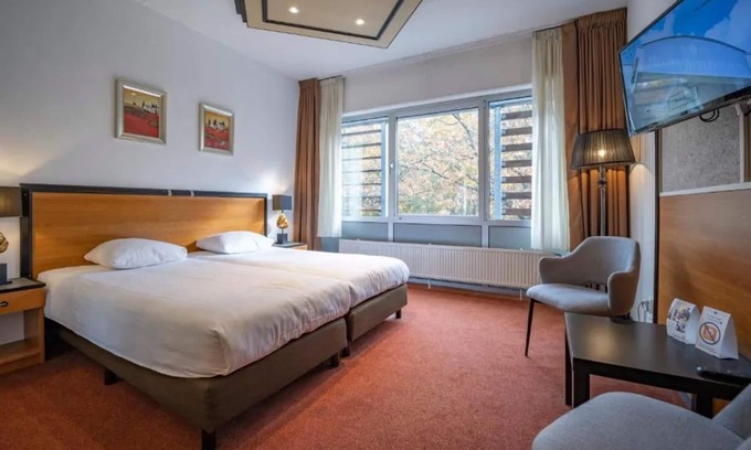 Apeldoorn Hotel | Stay Close to Theater Orpheus with Free Parking and Access to Nature Trails