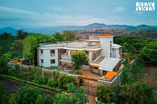 Kune Village Villa | StayVista at Seraphim Peak with Pool & Views