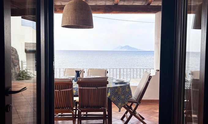 Acquacalda Cottage | Strongyle-Aeolian-style cottage on the beach with beautiful terrace and W-fi