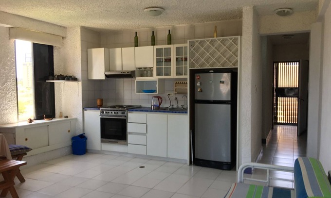 Margarita Island Apartment | Studio apartment in front of C.Cial La Vela, near the beach, with swimming pool and 24 hour security.