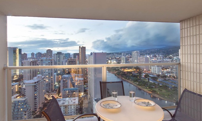 Waikiki Apartment | Studio with hardwood floors, ocean views - pool, hot tub, & sauna on-site