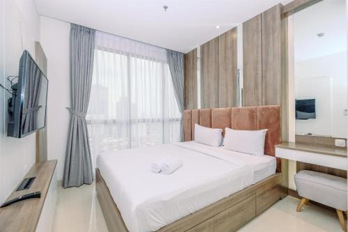 Semanggi Apartment | Stunning and Cozy 1BR Apartment at Ciputra World 2 By Travelio