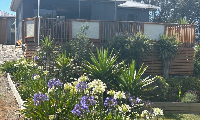 Waitarere Beach House | Stunning, sunny and renovated beach house with 2 spacious decks