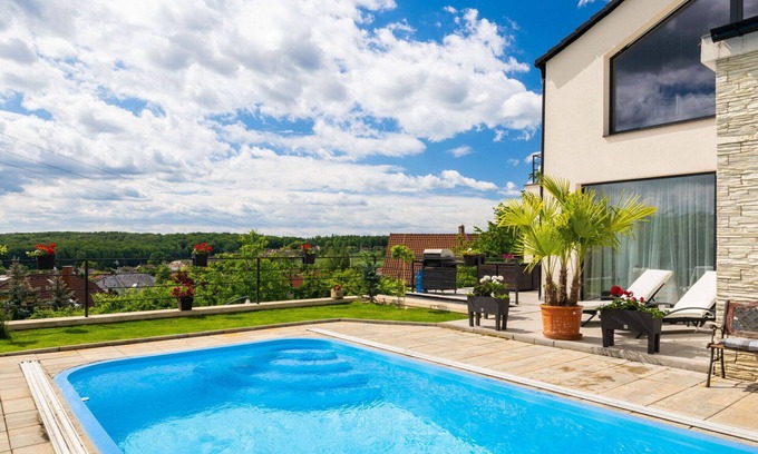 Lany Villa | Stunning villa for 4 guests with pool, WIFI, TV, balcony, panoramic view and parking