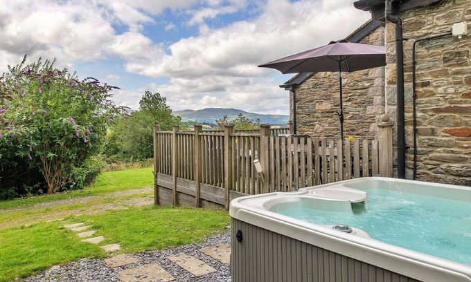 Eglwysbach House | Stunning villa for 4 people with WIFI, hot tub, terrace and pets allowed