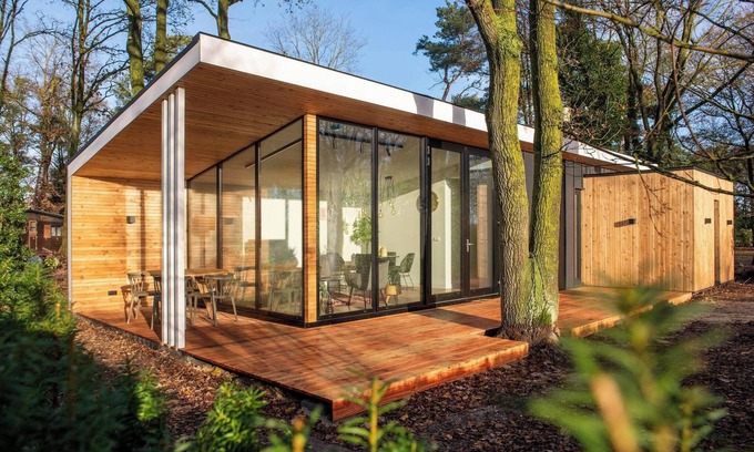 Maasbree House | Stylish forest cottage with private sauna and hot tub, surrounded by greenery. Ideal for couples or families seeking peace and wellness.