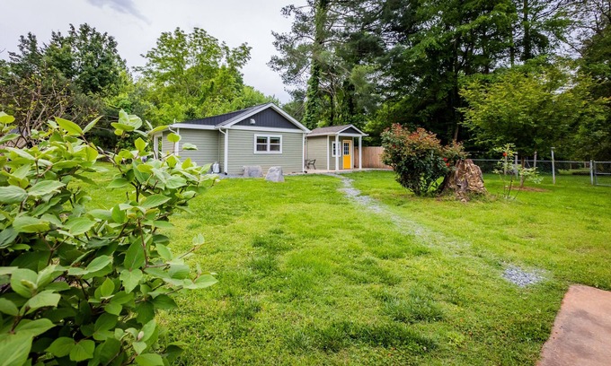 Sunset Road Cottage | Stylish renovated cozy cottage studio in quiet neighborhood 10 minutes to Uptown