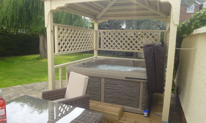 Rhuddlan Apartment | Suite for 2 with exclusive Hot Tub, robes, garden in Historic Castle Town