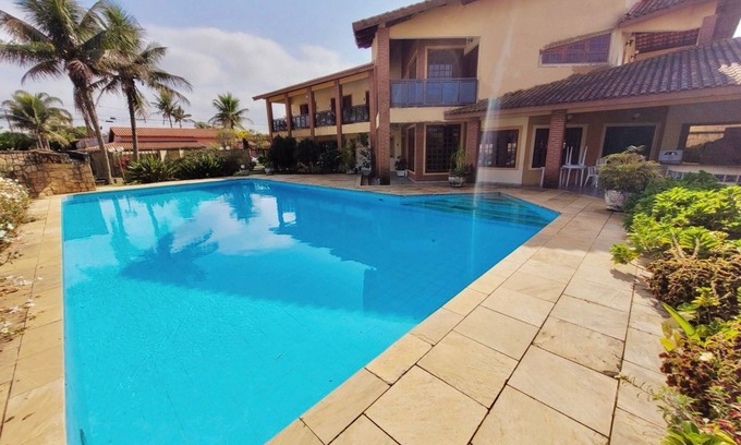 Raul Cury House | Summer in Itanhaém, the largest swimming pool in the region!