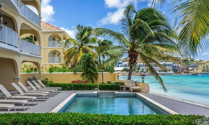 Simpson Bay Condo | Sun-kissed Beachfront Condo with Pool & Gorgeous Sunsets at Encanto- La Siesta