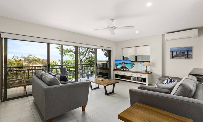 Noosa Heads Apartment | Sundowner 3 - A fantastic view over Laguna Bay to the Noosa North Shore beach.
