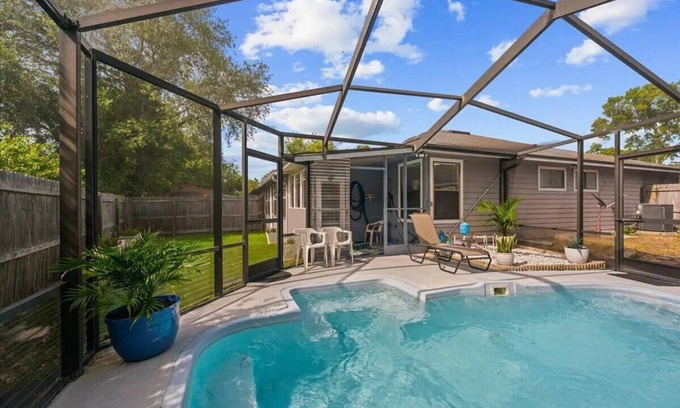 Arlington House | Sunny Florida home with a pool