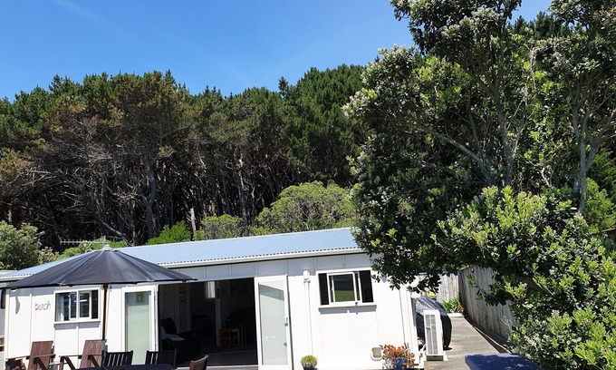 Waitarere Beach House | Sunny, well appointed bach for you to enjoy. Just minutes walk to the beach