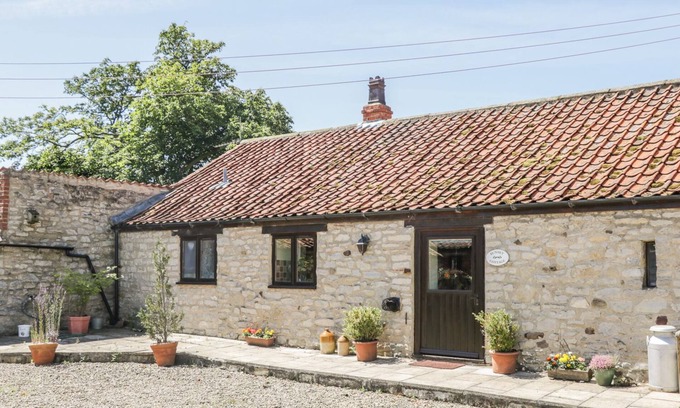 Scawton Cottage | SUNSET COTTAGE, pet friendly, with open fire in Kirkbymoorside