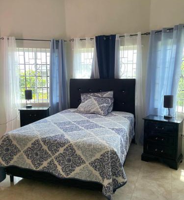 Long Bay House | Sunset grove hideaway