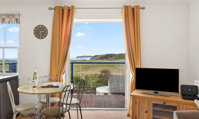 Penally Apartment | Surf Deck - Lovely Apartment, Spectacular Coastal Views, Short Walk to Beach