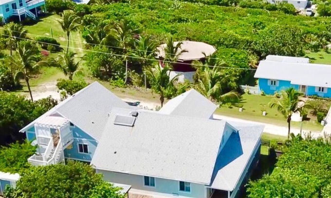 Rainbow Bay House | Sweet Merlot - A Family Rental with a Pool & walking distance to Twin beach