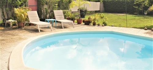 Punaauia Apartment | TAHITI - Sanny's Place Room & Pool