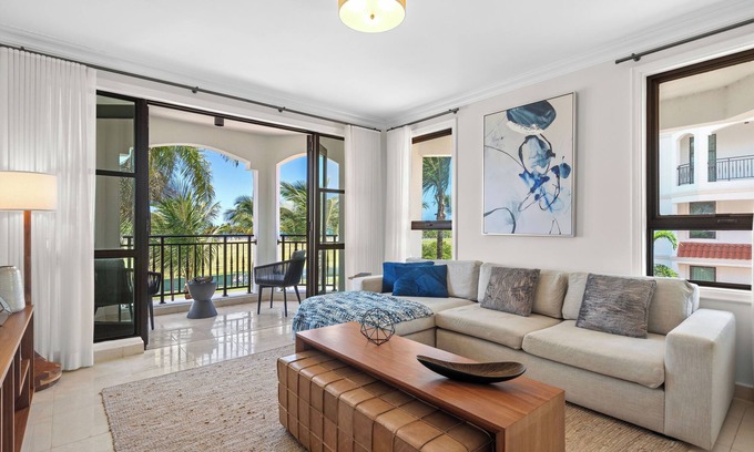 Zarzal Apartment | The Country Club Residences at Grand Reserve | Balcony with Beach & Golf Course Views | by Otium