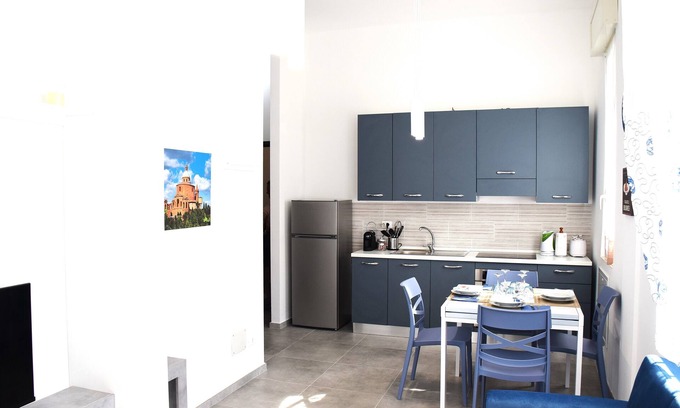 San Donato Apartment | THE DIMORA IN BLUE NEAR THE FAIR, UNIVERSITY, SANT'ORSOLA POLICY CENTER.