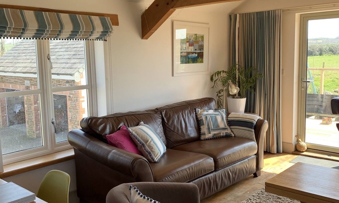 Widemouth Bay House | The Hayloft. Beautiful three bedroom barn near sandy beaches, near Bude.