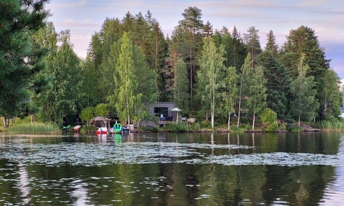 Sandviken House | The lake house - boats, beach, sauna and barbecue