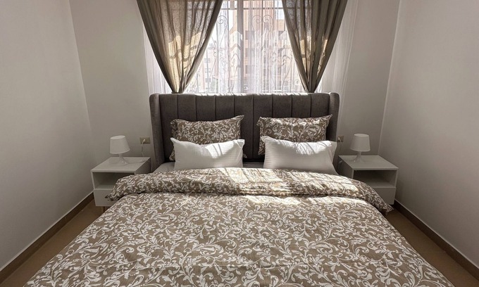 Sahab Apartment | The Mosaic HomenChic apartment in Madaba with Modern Amenities
