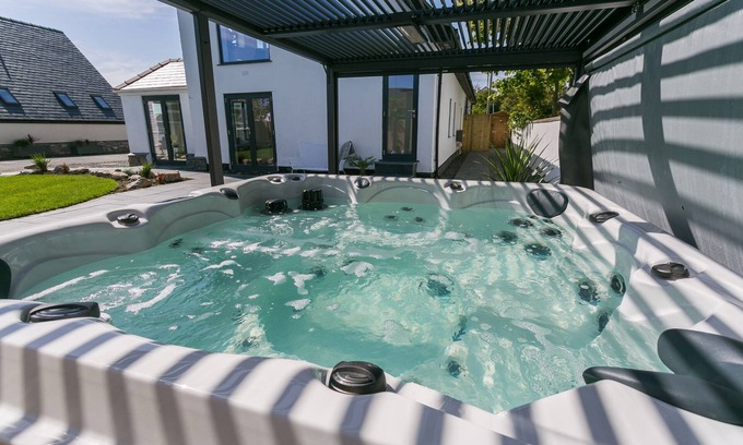 Trearddur Bay Cottage | The Old Abbey - a hot tub that sleeps 16 guests in 6 bedrooms
