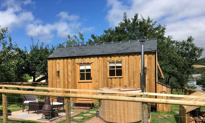 Brushford House | The Orchard Hut- A bespoke shepherds hut with wood fired hot tub.